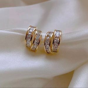 Gold tone geometric arc earrings